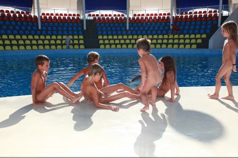 Swimming dolphins photo gallery - Nudism and natural harmony