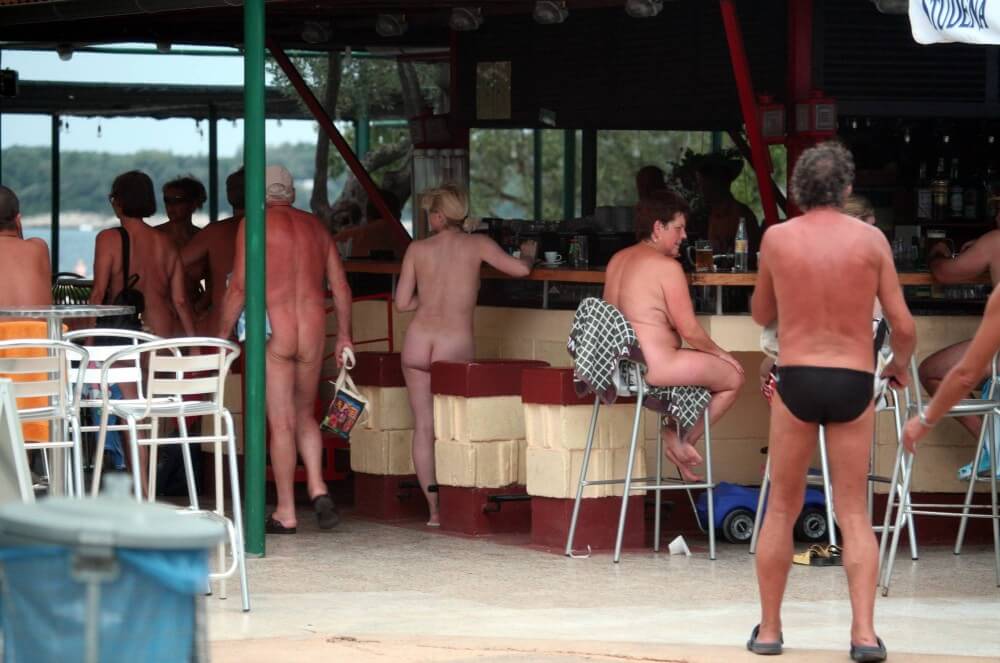 Outdoor diner view - Support and mutual understanding are important in the nudism movement