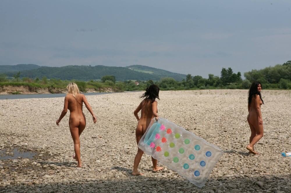 Naturist Park Floating On River photos - Nudism and naturism value harmony and balance