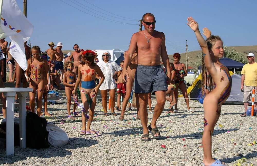 Beach Time Talent Show pics - Values trust and friendliness among naked people