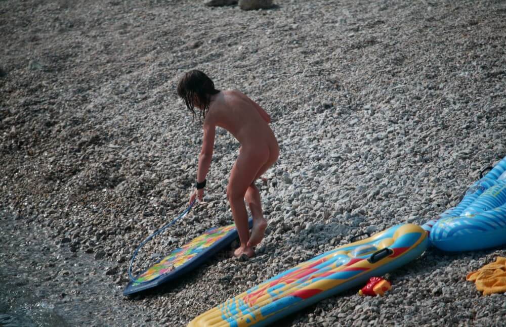 Naturist Surf Board Glides pics - In naturism, nature serves as the bodys natural clothing