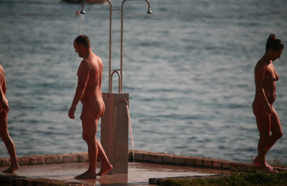 Naturist Shower at Dusk pics - Spiritual and physical harmony are essential in nudist culture
