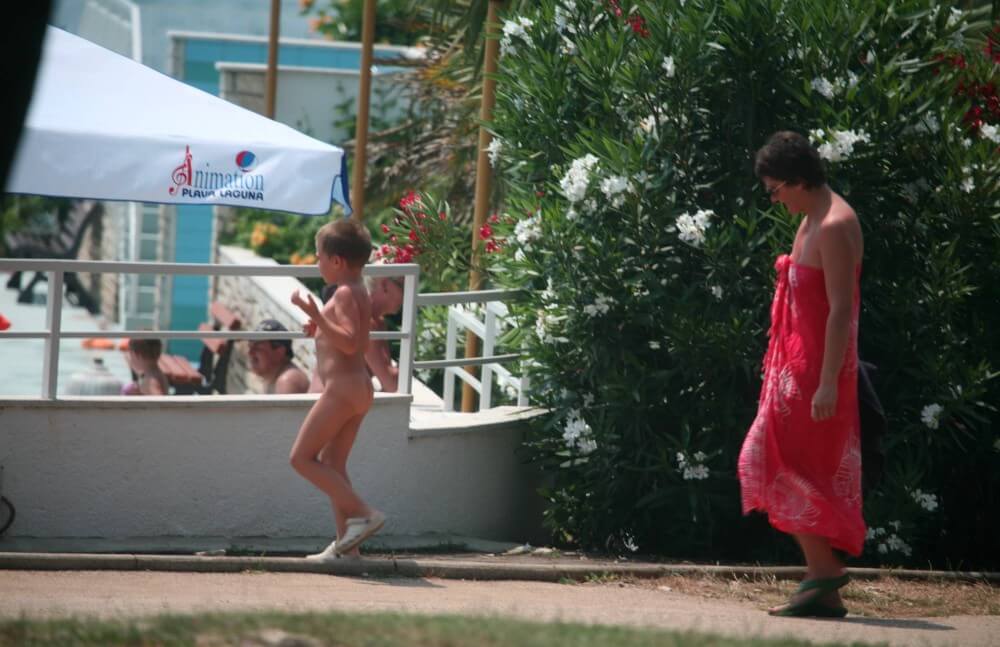 Naturist Pool Walkaround pics - Watching naked nudists
