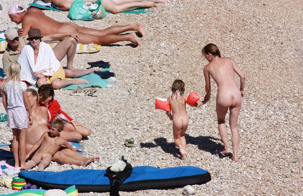 Orange Floaty Safety First Naturist pics - Nudism improves health and boosts self-esteem