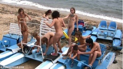 A group of naturists at sea - Blending in with the crowd of nudists